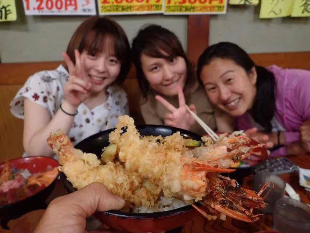 静岡県沼津市・丸天での沼津の丸天で大きな海鮮天ぷらを囲む仲間